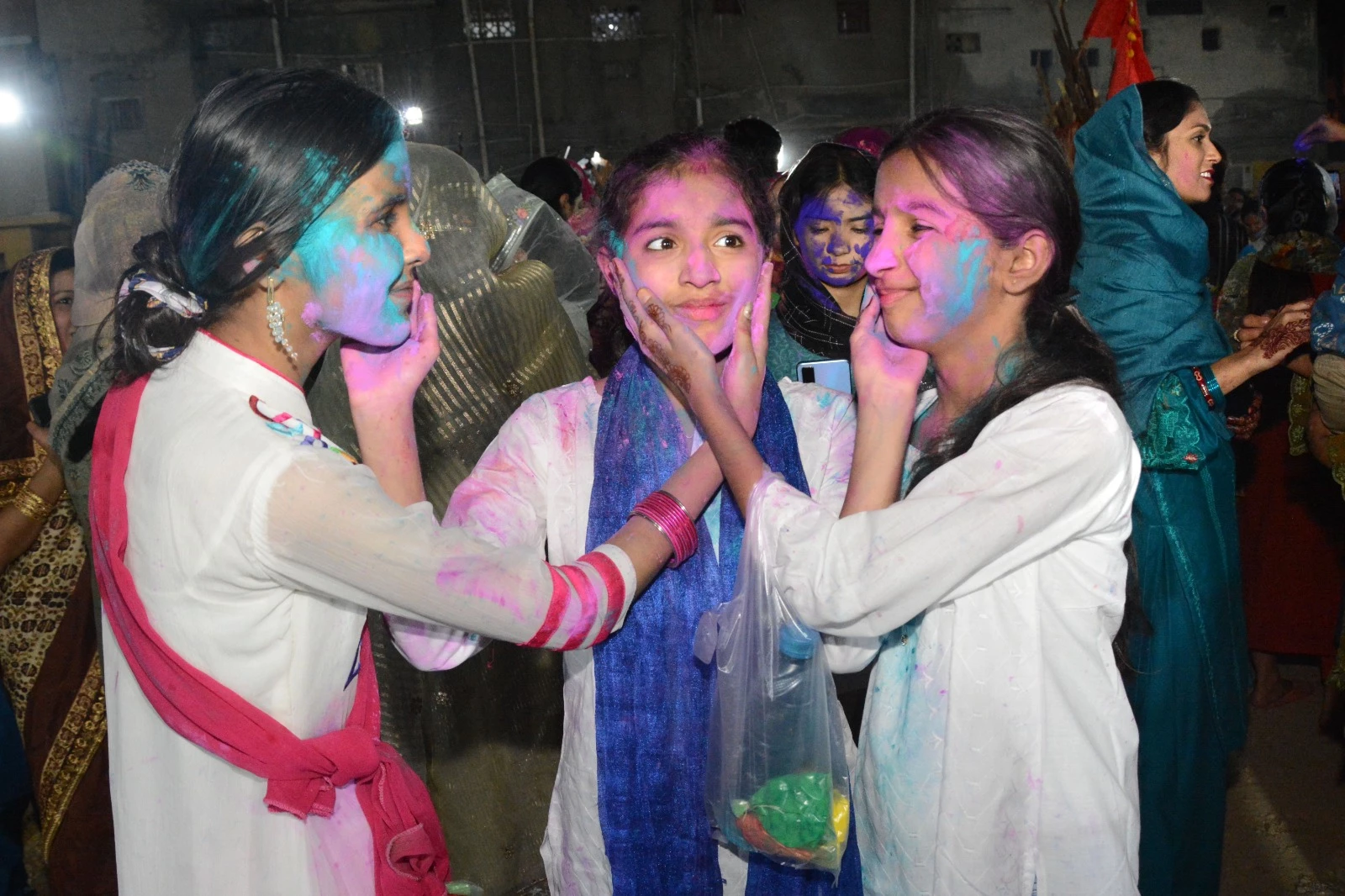 festival of colours young girls smear colour on each other as part of holi celebrations at the swaminarayan mandir in karachi photo express festival of colours young girls smear colour on each other as part of holi celebrations at the swaminarayan mandir in karachi photo express