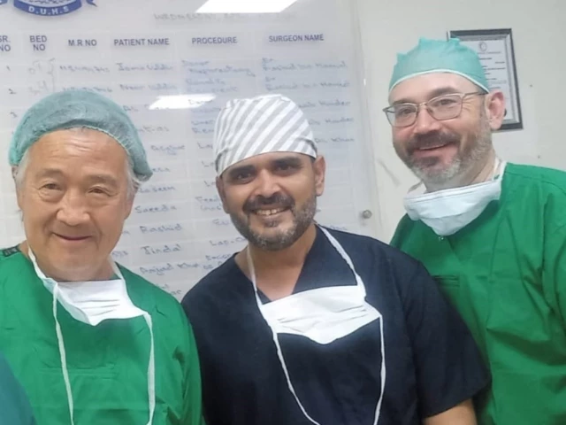jehanzaib haider professor john lamattina and professor john fung pose after successfully completing a liver transplant photo express