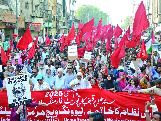 participants of the rally pass through zaibunnisa street carrying banners and flags demanding a just and fair homeland photo jalal qureshi express participants of the rally pass through zaibunnisa street carrying banners and flags demanding a just and fair homeland photo jalal qureshi express