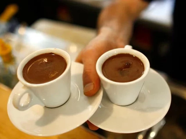 a waiter carries two cups of turkish coffee at a coffee shop in istanbul october 19 2007 photo reuters a waiter carries two cups of turkish coffee at a coffee shop in istanbul october 19 2007 photo reuters