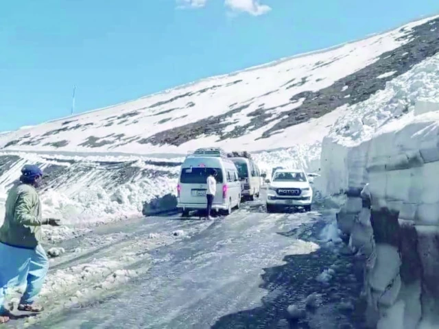 vehicles resume journey through snow covered babusar pass as it reopens after winter closure the opening marks the return of travel and tourism activity in the region photo express vehicles resume journey through snow covered babusar pass as it reopens after winter closure the opening marks the return of travel and tourism activity in the region photo express