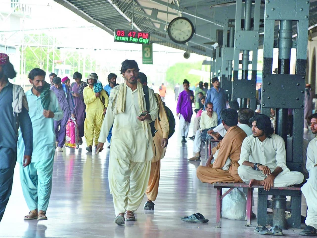 rawalpindi railway station is crowded with travellers departing for their ancestral villages and towns to celebrate eid with their loved ones photo agha mahroz express