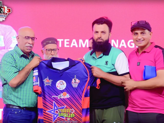 e test cricketer tauseef ahmed presents team jersey to tunger stars captain haroon tara during kpl season 3 drafting ceremony photo kpl e test cricketer tauseef ahmed presents team jersey to tunger stars captain haroon tara during kpl season 3 drafting ceremony photo kpl