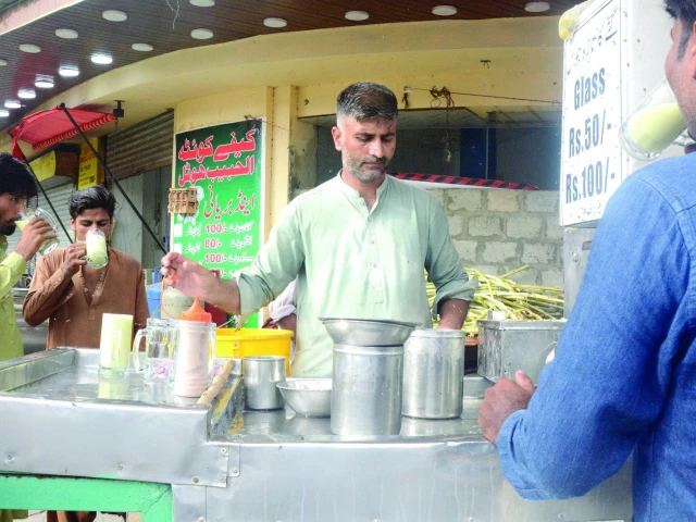 as heatwave like conditions grip the city passersby find a refreshing escape in glasses of chilled sugarcane juice karachi s favourite remedy for the sweltering summer heat photo jalal qureshi express as heatwave like conditions grip the city passersby find a refreshing escape in glasses of chilled sugarcane juice karachi s favourite remedy for the sweltering summer heat photo jalal qureshi express