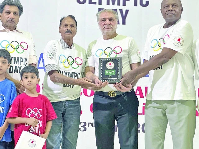 chief guest and kbba patron javed jhangra is being presented a shield by soa secretary ahmed rajput and finance secretary asghar baloch former hockey captain and olympian nasir ali is also seen photo kbb chief guest and kbba patron javed jhangra is being presented a shield by soa secretary ahmed rajput and finance secretary asghar baloch former hockey captain and olympian nasir ali is also seen photo kbb