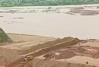 authorities make a controlled breach to release accumulated water from the dadocha dam s catchment area reducing the immediate threat of a larger flood photo express