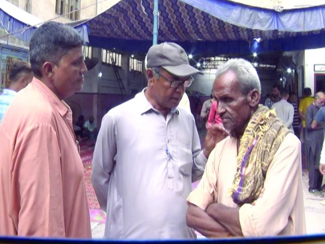 relatives express condolence with jumma devjee hinjora who lost all of his family members in the lyari building tragedy photo express relatives express condolence with jumma devjee hinjora who lost all of his family members in the lyari building tragedy photo express