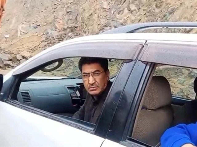 gilgit baltistan s finance minister engineer muhammad ismail scuffles with flood affected residents in ghanche district s ghursey area on july 25 2025 screengrab