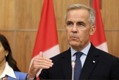 canadian prime minister mark carney r flanked by canadian foreign affairs minister anita anand speaks during a press conference after a cabinet meeting in ottawa ontario canada on july 30 afp