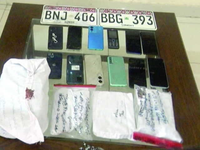 confiscated number plates and cell phones photo express