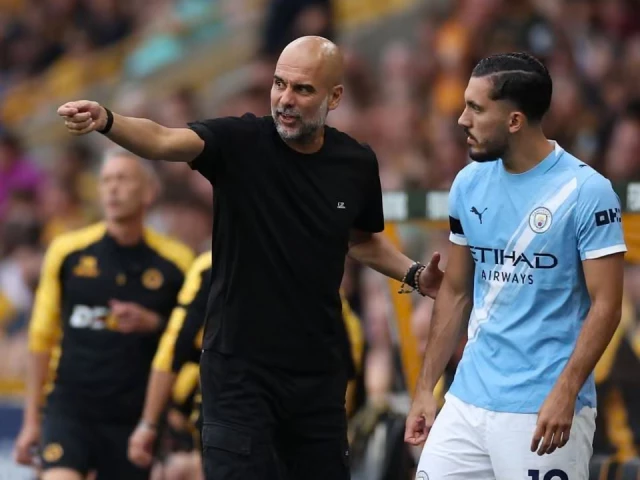 pep guardiola passes on instructions to rayan cherki before the substitute takes the field pep guardiola passes on instructions to rayan cherki before the substitute takes the field