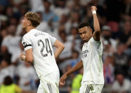 real madrid scrape past osasuna
