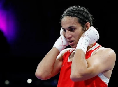 olympic champion khelif denies retirement from boxing