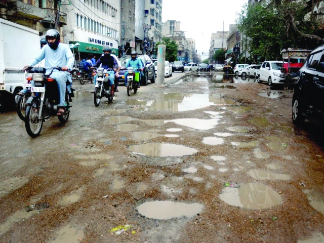 new chali road s pothole predicament worsens with rainwater accumulation causing inconvenience for commuters the potholes are a testament to the area s infrastructure woes now exacerbated by the monsoon rains photo jalal qureshi express new chali road s pothole predicament worsens with rainwater accumulation causing inconvenience for commuters the potholes are a testament to the area s infrastructure woes now exacerbated by the monsoon rains photo jalal qureshi express