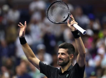 djokovic overcomes bad back to make us open last 16 djokovic overcomes bad back to make us open last 16