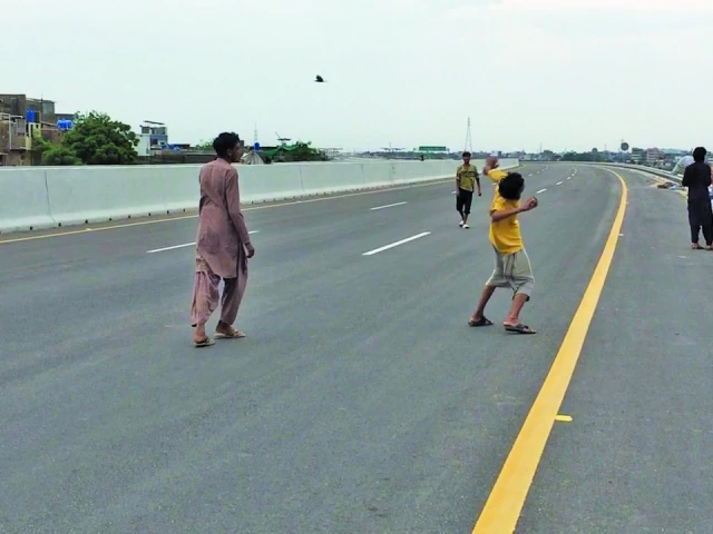 as dusk descends shahrah e bhutto transforms into the city s most unpredictable playground where the thrill of speed meets the peril of pedestrian pursuits and the city s apathy is laid bare photo express