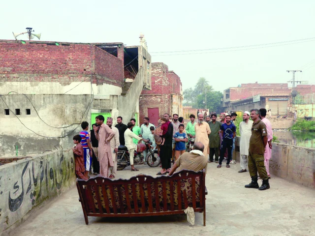 a police officer sits on a sofa to stop residents from going towards flooded areas following the monsoon rains and rising water level in farrukhabad along the ravi river in lahore photo reuters a police officer sits on a sofa to stop residents from going towards flooded areas following the monsoon rains and rising water level in farrukhabad along the ravi river in lahore photo reuters
