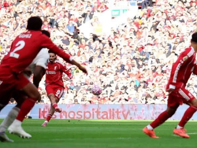 liverpool s dominik szoboszlai scores their first goal from a free kick photo reuters