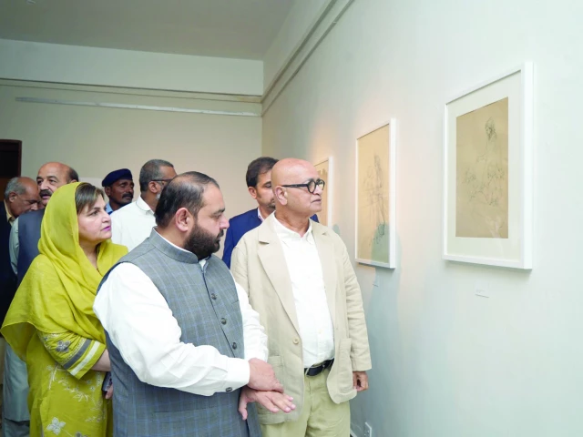 federal minister for national heritage and culture division aurangzeb khan khichi considers the artworks of celebrated artists after inaugurating a restrained grace exhibition organised by the pnca in the federal capital photo express federal minister for national heritage and culture division aurangzeb khan khichi considers the artworks of celebrated artists after inaugurating a restrained grace exhibition organised by the pnca in the federal capital photo express