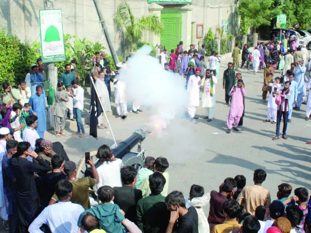 in a ritual of faith and remembrance participants fire a fake canon its echo carrying the spirit of eid milad un nabi pbuh photo express in a ritual of faith and remembrance participants fire a fake canon its echo carrying the spirit of eid milad un nabi pbuh photo express