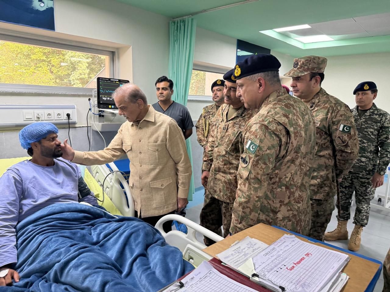 PM Shehbaz and COAS Asim Munir enquires after injured soldiers at CMH Bannu. (Photo Courtesy: PTV News via X)