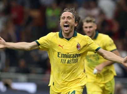 timeless modric opens ac milan account with winner against bologna
