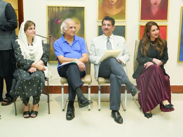 artist and poet raja changez sultan sits alongside members of the art community at his retrospective exhibition as he presents his life s work at the pnca in the federal capital photo express artist and poet raja changez sultan sits alongside members of the art community at his retrospective exhibition as he presents his life s work at the pnca in the federal capital photo express