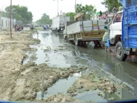 a key thoroughfare from malir cantt to malir halt crumbles into a treacherous stretch of potholes and sewage water turning daily commutes into trials of endurance photo express