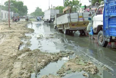 a key thoroughfare from malir cantt to malir halt crumbles into a treacherous stretch of potholes and sewage water turning daily commutes into trials of endurance photo express