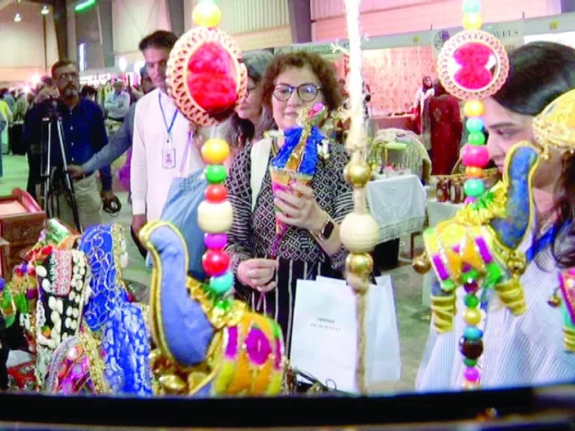 women appreciate handicraft on display at the daachi arts and crafts festival which wrapped up at the expo centre on sunday photo express