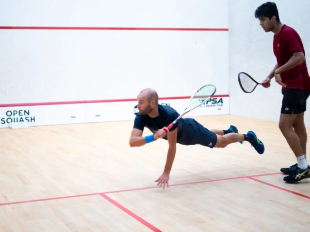 noor zaman defeated gr goire marche in a hard fought 3 2 battle to advance to the open squash classic quarterfinals photo courtesy zulfiqar baig