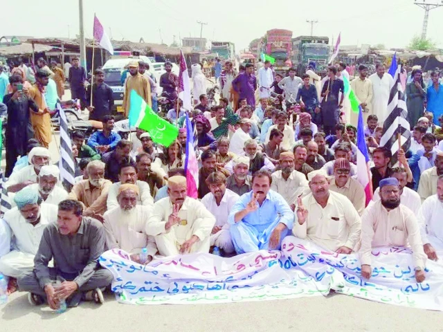 rice growers and members of various political parties stage a sit in protest in badin over paddy price crash photo express