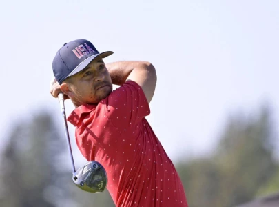 schauffele jumps into share of second in japan