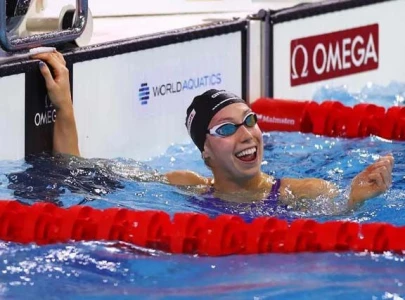 walsh wins world cup 50m fly in short course world record