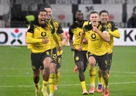 borussia dortmund players celebrate after knocking eintracht frankfurt out of the german cup on penalties photo afp