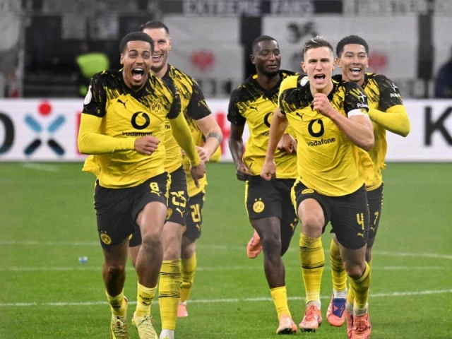 borussia dortmund players celebrate after knocking eintracht frankfurt out of the german cup on penalties photo afp borussia dortmund players celebrate after knocking eintracht frankfurt out of the german cup on penalties photo afp