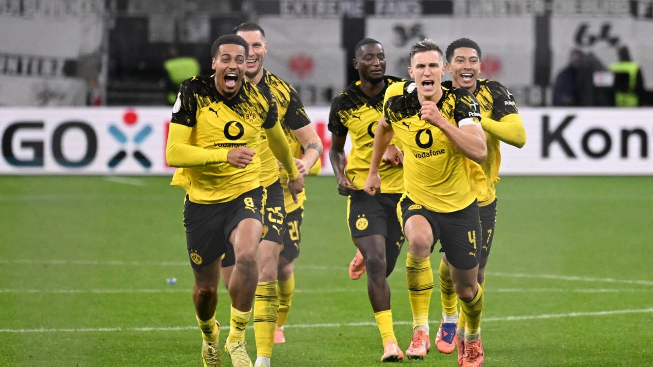 dortmund knock frankfurt out of german cup