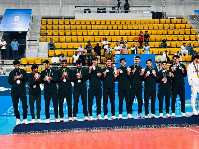 pakistan volleyball team after receiving their asian youth games silver medal photo pakistan olympic association pakistan volleyball team after receiving their asian youth games silver medal photo pakistan olympic association