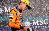 norris extends title lead in sao paulo verstappen third from pit lane