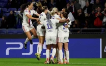 hegerberg double sees lyon past wolfsburg in champions league