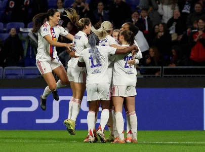 hegerberg double sees lyon past wolfsburg in champions league