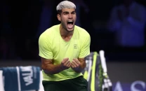 alcaraz clinches year end top spot with atp finals win over musetti