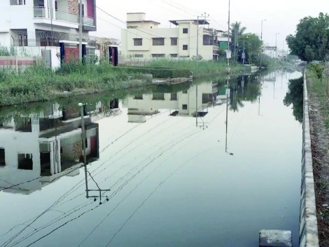 authorities have turned a blind eye to the plight of residents in scheme 33 where overflowing sewage has inundated several neighbourhoods photo express