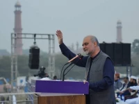 ji chief hafiz naeemur rehman addressing the opening session of the party s three day congregation at the minar e pakistan in lahore photo x file