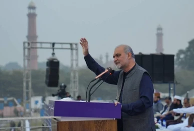 ji chief hafiz naeemur rehman addresses the opening session of the party s three day congregation begins at the historic minar e pakistan in lahore photo x