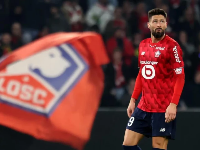 lille s forward olivier giroud reacts after scoring a goal during the match against paris fc photo afp