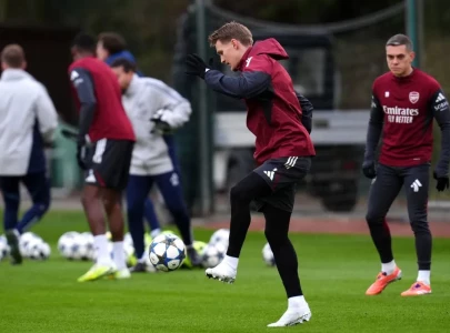 arsenal s martin odegaard attends a team training session at the sobha realty training centre london tuesday ahead of wednesday s champions league match against bayern munich photo afp