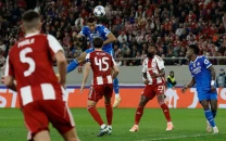 mbappe hits four as real madrid hold off olympiacos in thriller