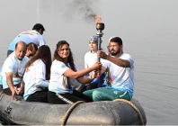 olympian sadaf siddiqui along with other participants holds the torch during the 35th national games torch relay ceremony at rawal lake islamabad app