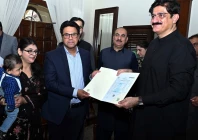 sindh cm murad ali shah presents a birth certificate to a parent during a launch of the civil registration management system crms mobile application at cm house in karachi on november 28 photo ppi